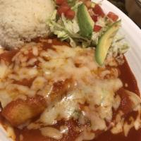 Enchiladas Chipotle · 3 chicken enchiladas topped with chipotle sauce and cheese served with white rice, lettuce, ...