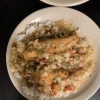 Smothered Catfish Over Rice · 