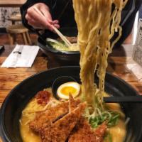 Spicy Katsu Ramen · House deep-fried tonkatsu (pork cutlet), egg ramen noodle, 1/2 soy flavored egg, scallions, ...