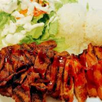 Chicken and Beef Combo · Served with rice and salad.