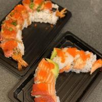 Tornado Maki · Shrimp tempura base + spicy ahi on top and sears with garlic mayo.