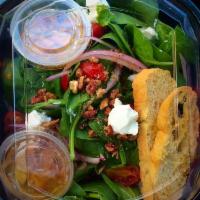 Urban Salad · Baby spinach, shaved red onion, homemade candied pecans, crumbled goat cheese, grape tomatoe...