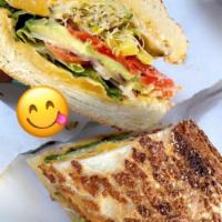 Veggie Sandwich · Alfalfa sprouts, roasted peppers, avocado, cucumber, pepperoncinis, Swiss cheese and Lou's s...