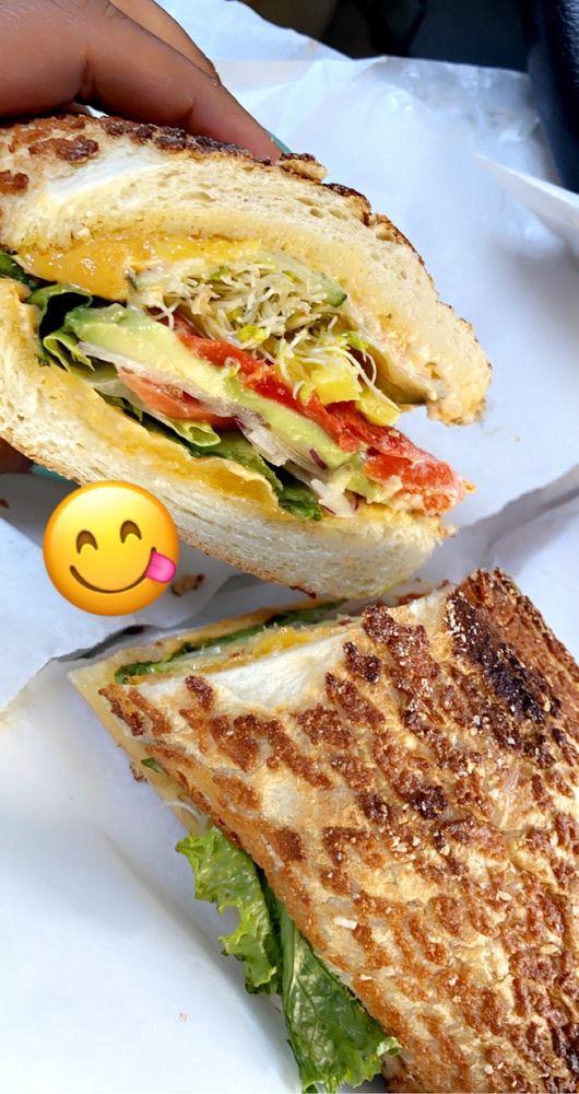Veggie Sandwich · Alfalfa sprouts, roasted peppers, avocado, cucumber, pepperoncinis, Swiss cheese and Lou's special sauce on a 9-grain wheat roll. Includes lettuce, tomatoes, red onions, pickles and jalapeno spread.