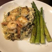 Shrimp and Scallop Risotto · Sauced shrimps, scallops, asparagus and risotto in beurre blanc sauce.