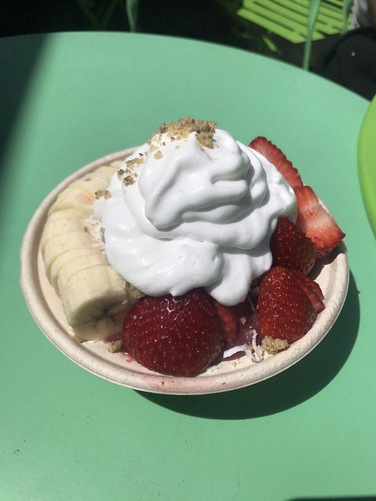 Acai Bowl · Unsweetened organic Acai, almond milk, bananas, strawberries, topped with coconut flakes, coconut whipped cream and crushed walnuts. Raw, vegan, gluten free and non dairy.