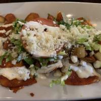 Enchiladas Mineras · Corn tortilla dipped in guajillo sauce, filled With queso fresco and onions served with rice...