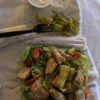 Grilled Chicken Garden Salad · Romaine lettuce, tomatoes, green peppers, red cabbage, cucumbers, carrots, olives and pepper...