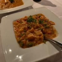 Vegetable Korma · Mixed vegetables cooked in delicately spiced with touch of creamy sauce and cashew nuts. Ser...