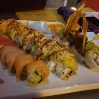 Rainbow Roll · Kani, avocado, yellowtail, salmon, and tuna.