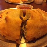 Calzone · Ricotta, mozzarella, and grated Parmesan.
Each roll comes with a side of marinara sauce. 
