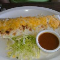 Carne Asada Burrito · Meat, beans, tomato and a mix of white and yellow cheese.