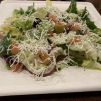 Greek Salad · Romaine lettuce, tomatoes, cucumbers, onions and green olives mixed in our original zesty sa...