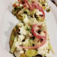 Sopes · Choice of meat, with beans, lettuce or cabbage, cheese, pico de gallo, avocado sauce, sour c...