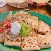 Quesadilla · Choice of meat, with lots of melty cheese  and salsa on the side.