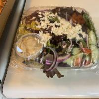 Greek Salad · Mixed greens and romaine, red onions, Kalamata olives, tomatoes, pepper cucumber, feta chees...