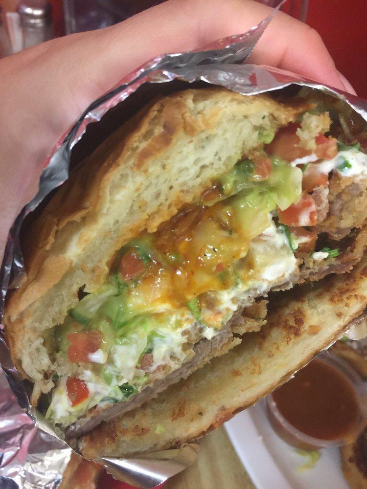 Torta · Pico, lettuce, guacamole, and sour cream in a grilled Mexican style bread with mayo.
