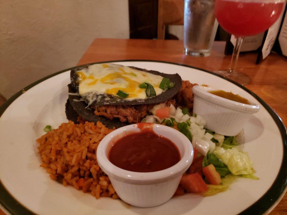 Blue Corn Enchiladas · Choice of slow-cooked shredded beef, chicken, or calabacitas. Served with rice and pinto beans. Choice of hatch green chile or red chile sauce.