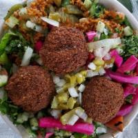 Falafel Bowl · Flash fried chickpeas smashed together with vegetables, jalapenos and Mr. Kabob's secret rec...