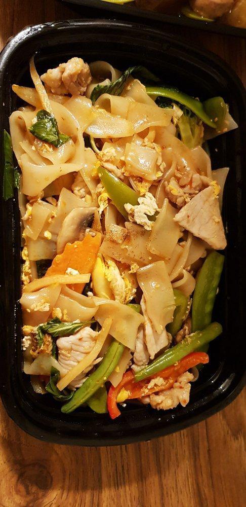Drunken Noodles · Stir-fried wide rice noodles with Thai hot basil sauce, egg, sweet basils and assorted vegetables. Spicy.