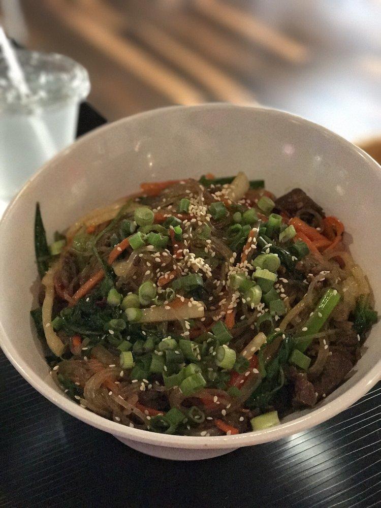 Japchae · Glass noodles with red peppers, carrots, spinach, mushrooms and thinly sliced marinated beef, all flavored with our Bonchon soy garlic sauce and stir-fried with sesame oil.