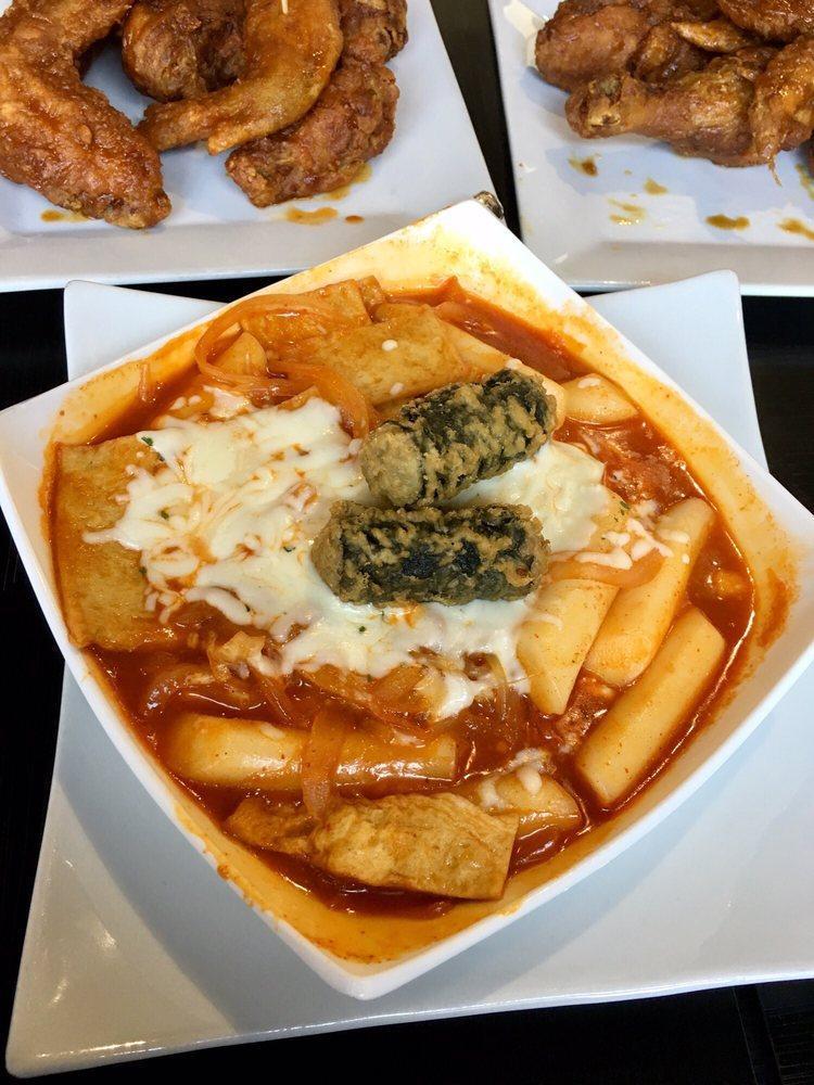 Tteokbokki · Chewy rice cakes, fish cakes and onions, stir-fried in a Korean red pepper sauce topped with mozzarella cheese.