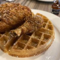 Chicken and Waffle · Jumbo crispy fried chicken, belgian waffle, butter, vermont maple syrup, powdered sugar
