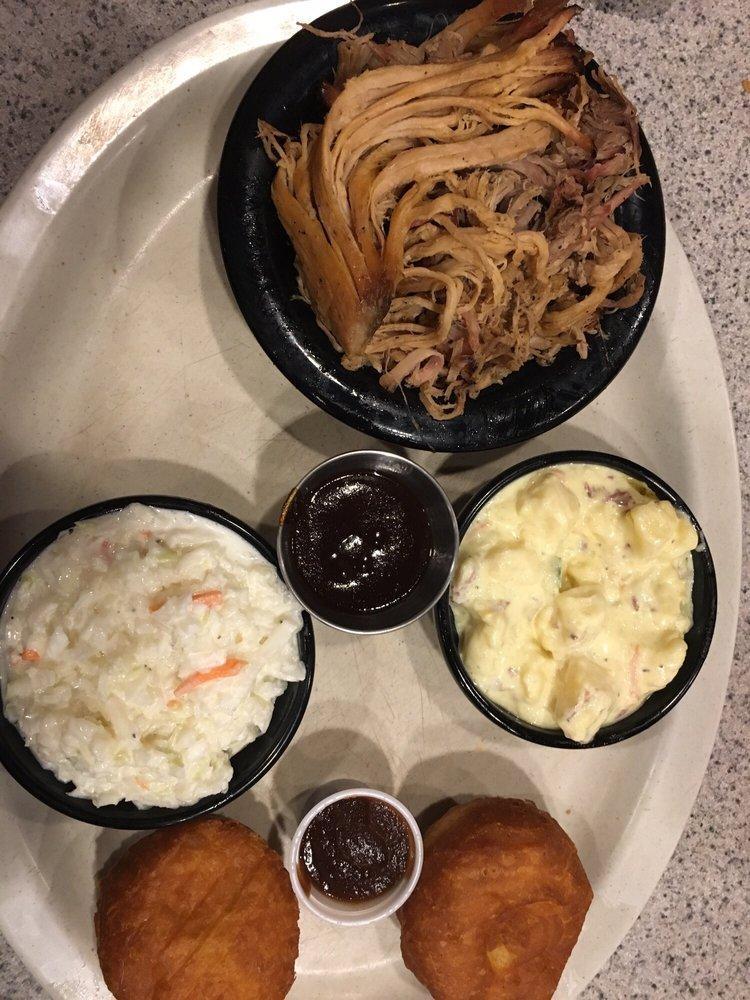 Pulled Pork Dinner · Smoked low and slow. Served with choice of 2 sides and fried biscuits and apple butter.