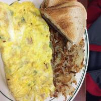 Western Omelettes · Green peppers, ham and onions. Made with 3 x-large eggs, served with hash browns toast and j...