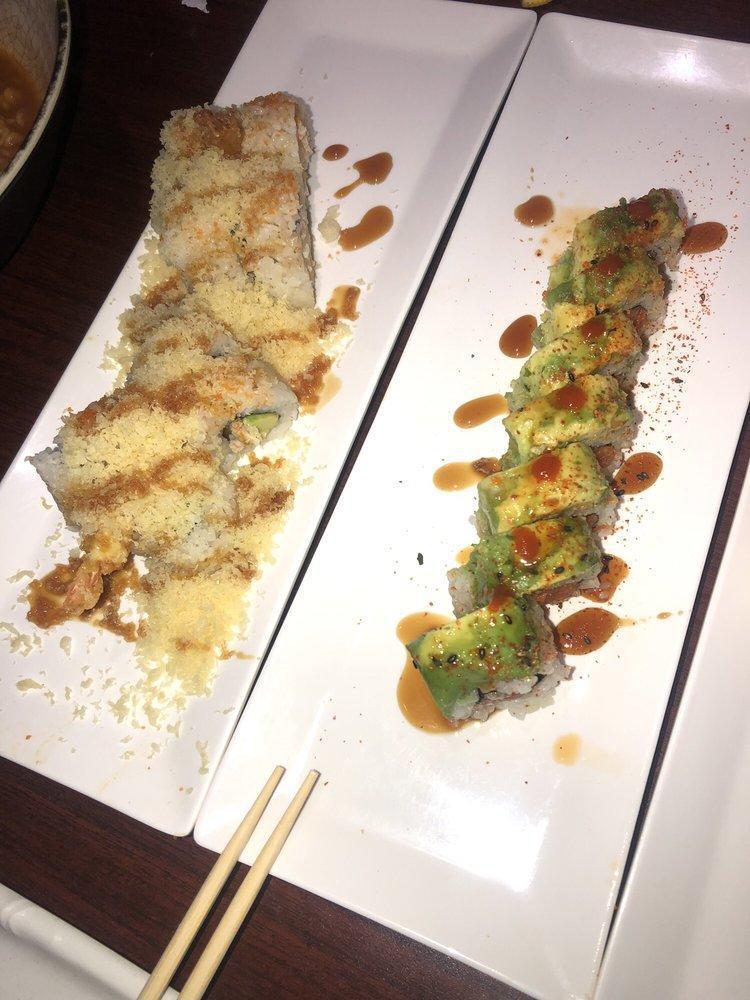 911 Roll · Spicy tuna roll with avocado on top, chill oil, red pepper, and eel sauce.