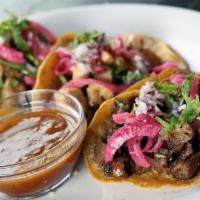 Street Tacos · Chile de arbol, onion, cilantro and lime. Served with a choice of protein.