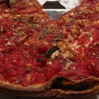 Vegan Pizza · Whole wheat crust, fresh spinach, fresh garlic, red onion, and daiya vegan cheese. Deep dish...