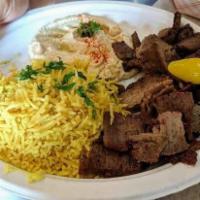 Gyro Platter · Traditional Chicago style gyro enriched with Greek herbs and spices roasted on a spit and sh...