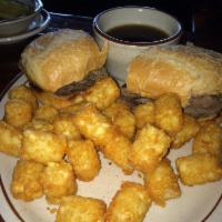 French Dunk Sandwich · A generous mound of thin sliced roast beef atop a toasted french roll, served with au jus. A...