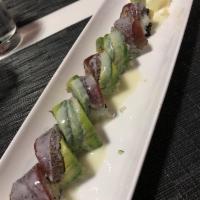 Amazing Roll · Spicy tuna, white tuna tempura and avocado inside, topped with pepper tuna and coconut mayo ...