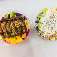 Aloha Bowl · Blended organic acai, banana and coconut topped with banana, blueberries, mango, kiwi, grano...