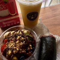 The Island Hopper Bowl · Blended organic acai, banana, mango and pineapple topped with strawberries, banana, mango, k...