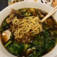Sumo Ramen Soup · Sun noodles, pork belly, braised pork, Asian broccoli, fish cake and poached egg.