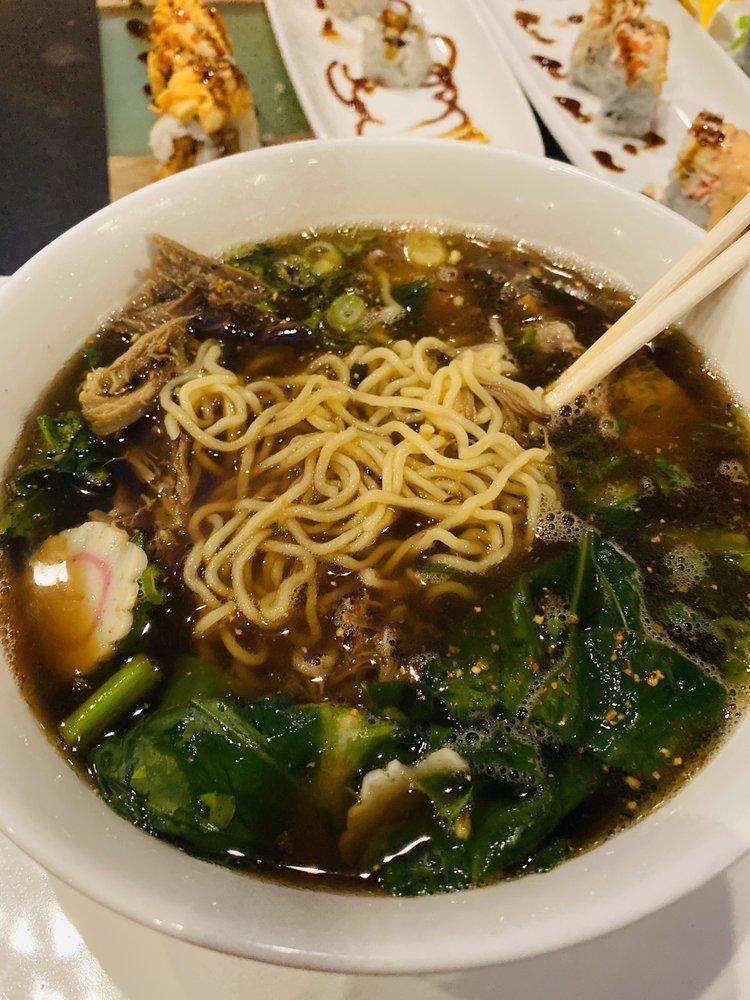 Sumo Ramen Soup · Sun noodles, pork belly, braised pork, Asian broccoli, fish cake and poached egg.