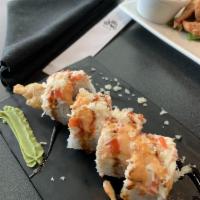 Rising Sun Roll · Shrimp tempura, kani, cucumber, topped with snow crab mix, tempura flakes, spicy mayo and un...
