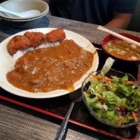 Curry Rice · Beef flavored Japanese curry. Served with rice and a small salad. 