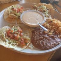 3 Fish Tacos · Flout tortilla with grilled fish garnished with cabbage, pico de gallo, and creamy house sau...