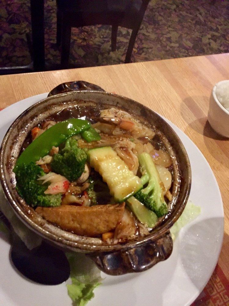 Seafood Hot Pot · A combination of shrimps, crawfish, scallops, tofu and assorted Chinese vegetables cooked with brown sauce and served in hot pot with steamed rice.