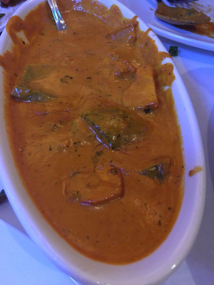 Chicken Tikka Masala · Chicken kabab in bay leaf flavored creamy tomato sauce with bell peppers and onion.