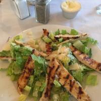 Classic Caesar Salad · Romaine hearts, garlic croutons and house-made dressing.