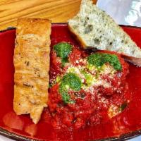 Meatballs · Old school style beef, veal and pork with tomato sugo, salsa verde, and Parmesan.