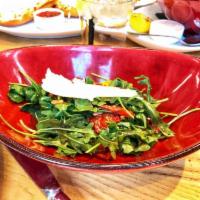 Arugula and Kale Salad · Roasted tomato, artichoke, mushrooms, shaved Parmesan, toasted pine nuts, and balsamic vinai...