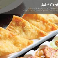 Crab Rangoon · Crabmeat mix with Philadelphia cream cheese wrapped in wonton skin, golden fried and served ...