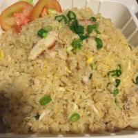 Crab Fried Rice · Stir-fried with Thai jasmine rice, egg, onion and crab meat.