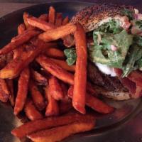 Fresno Fig Burger · Fig marmalade, melted goat cheese, bacon, tomatoes, red onions, arugula, and spicy porter mu...